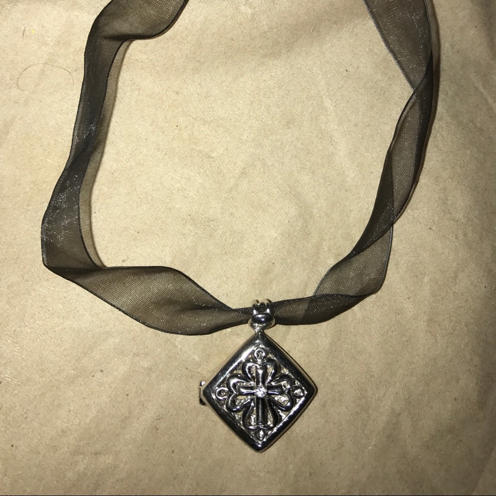 Beautiful Locket/Pendant with cut out CZ on ribbon